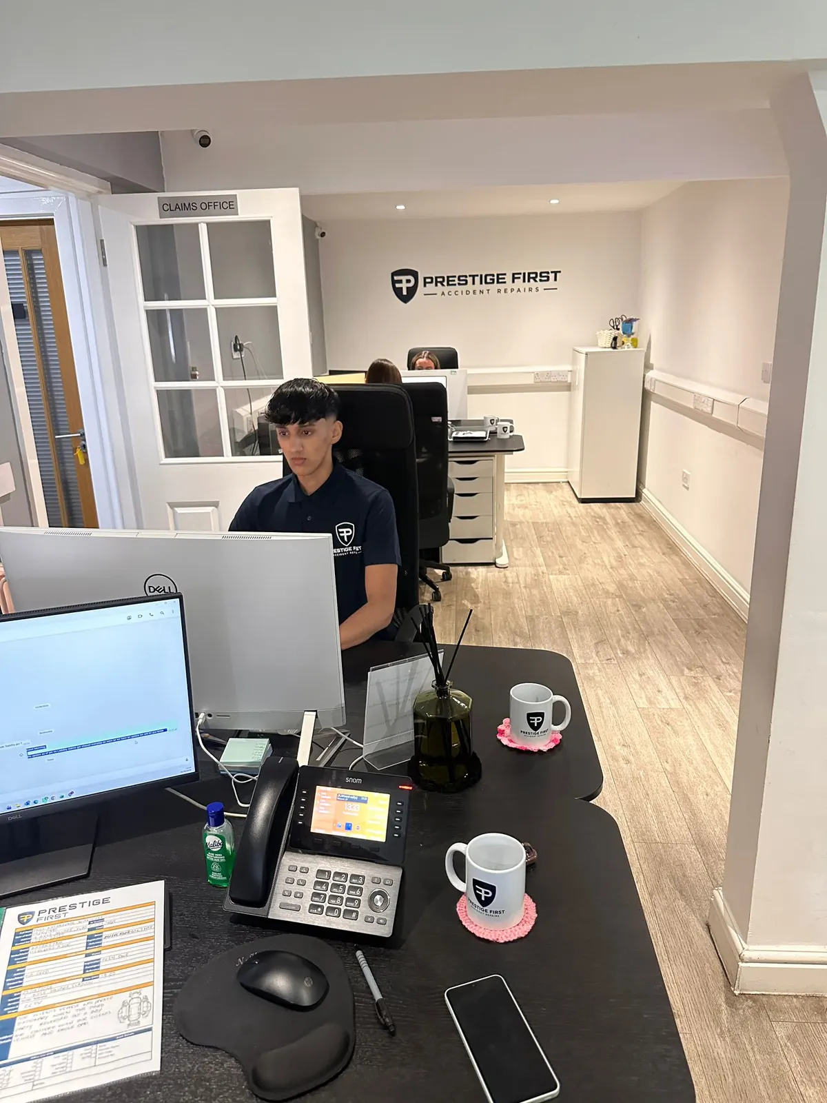 Prestige First claims team coordinating accident and insurance information