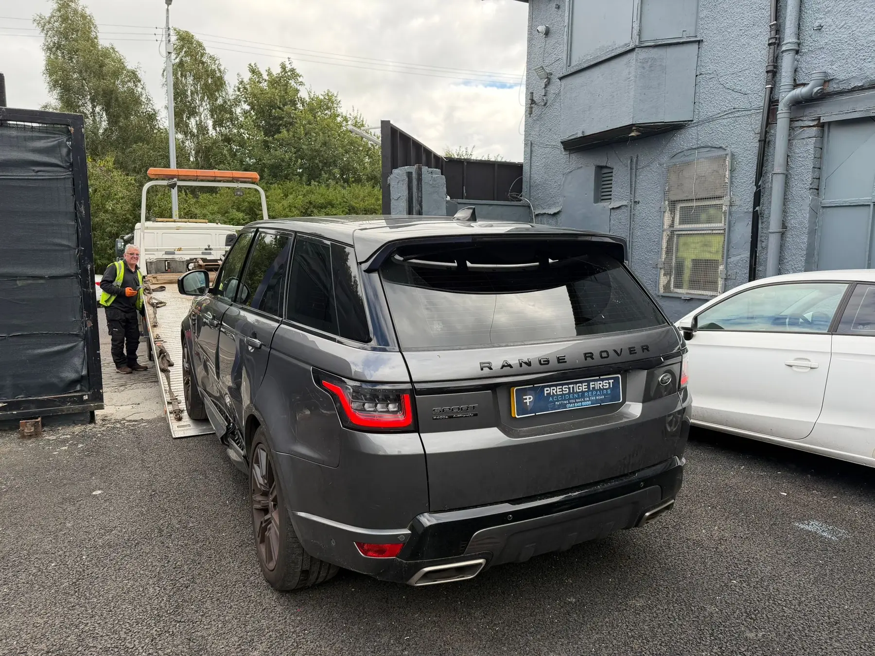 Range Rover being recovered at Prestige First in Glasgow