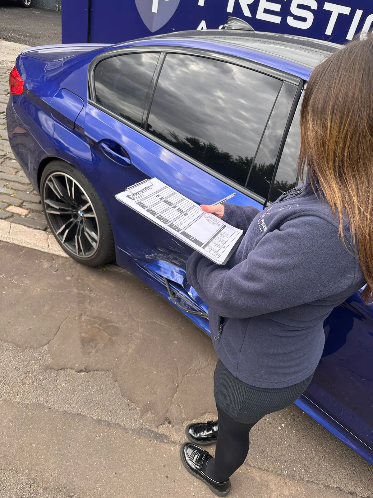 Prestige First accident management adviser helping a driver in Glasgow